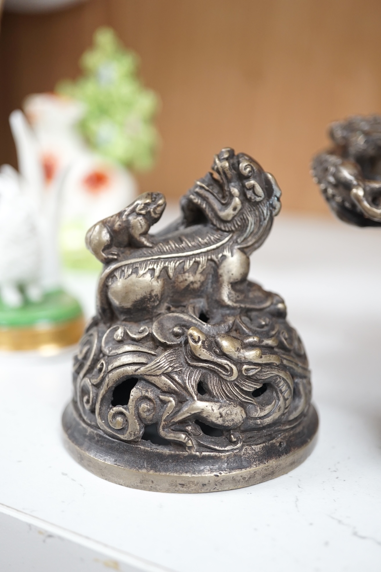 A Chinese silvered bronze lidded ‘dragon’ censer, 16cm tall. Condition - fair to good